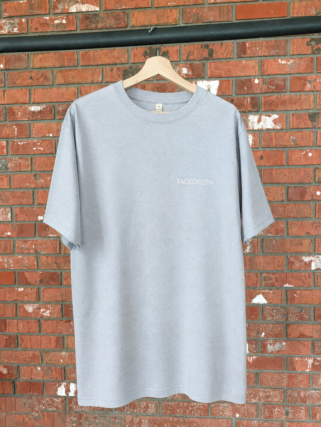 Faceofaith Oversized T-Shirt Christian t-shirt, hanger view | Face of Faith faith apparel