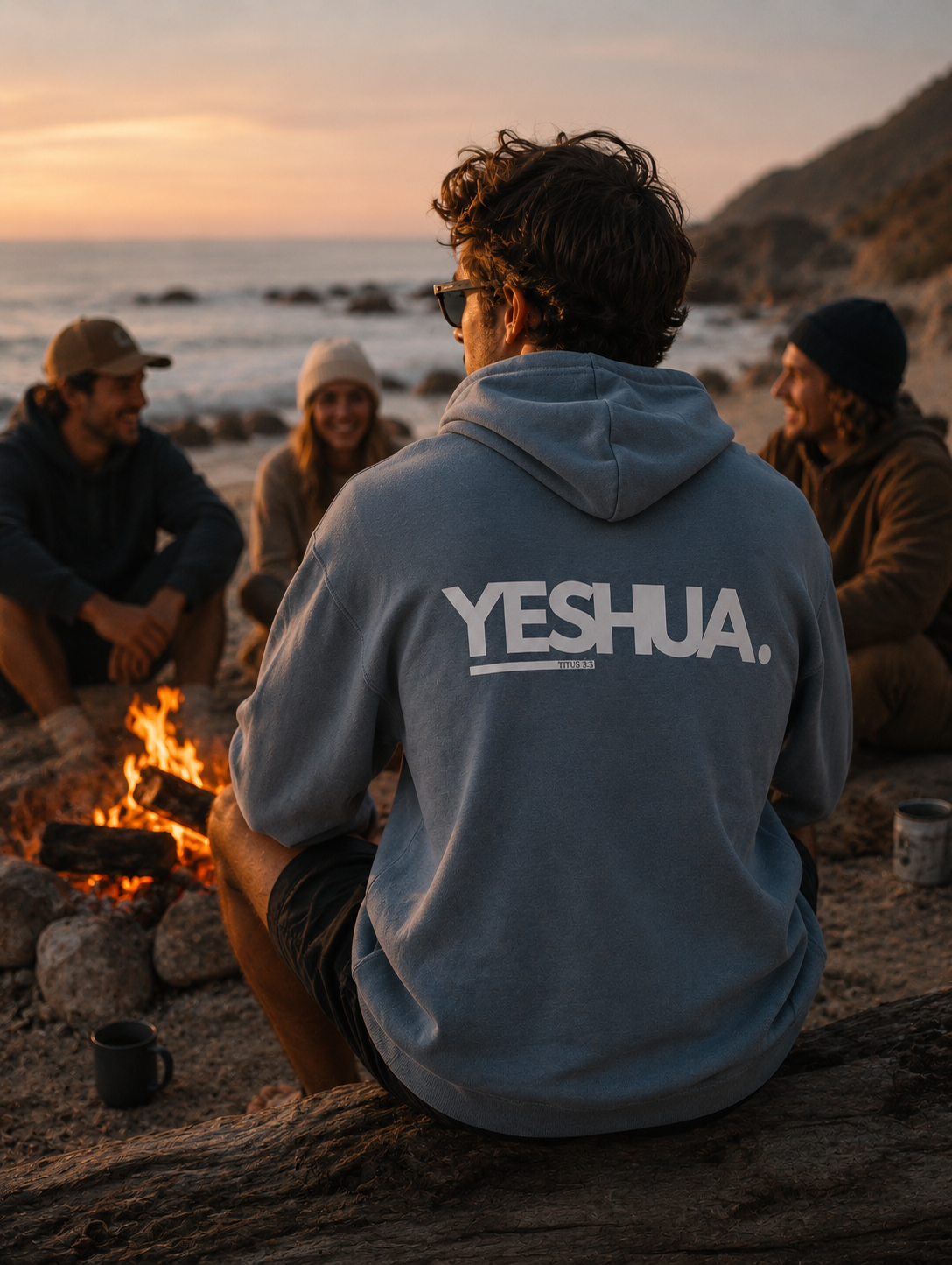 Yeshua Unisex Hoodie Christian hoodie, campfire lifestyle shot | Face of Faith faith apparel