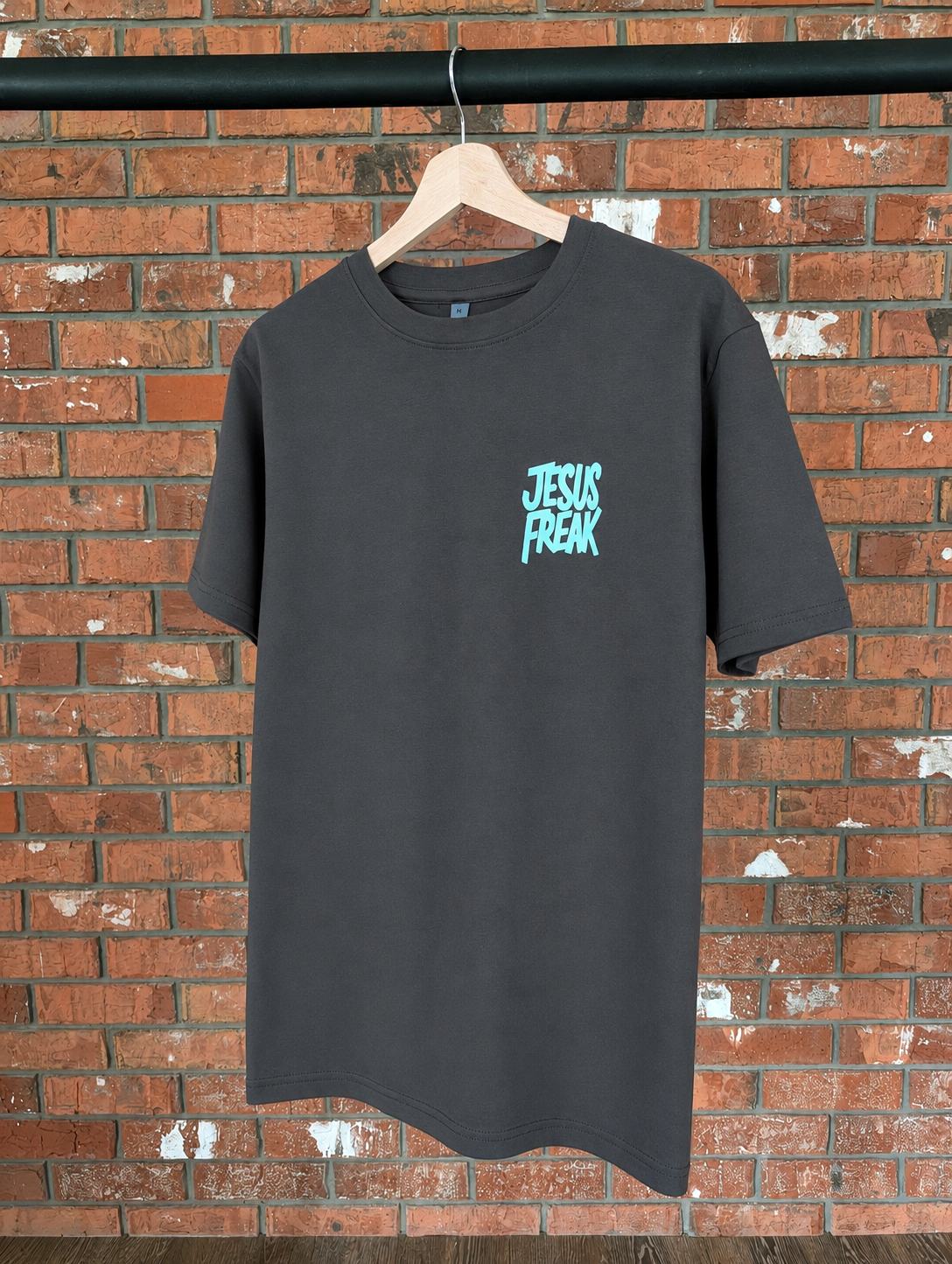 Jesus Freak T-Shirt Christian t-shirt, hanger view | Face of Faith faith apparel