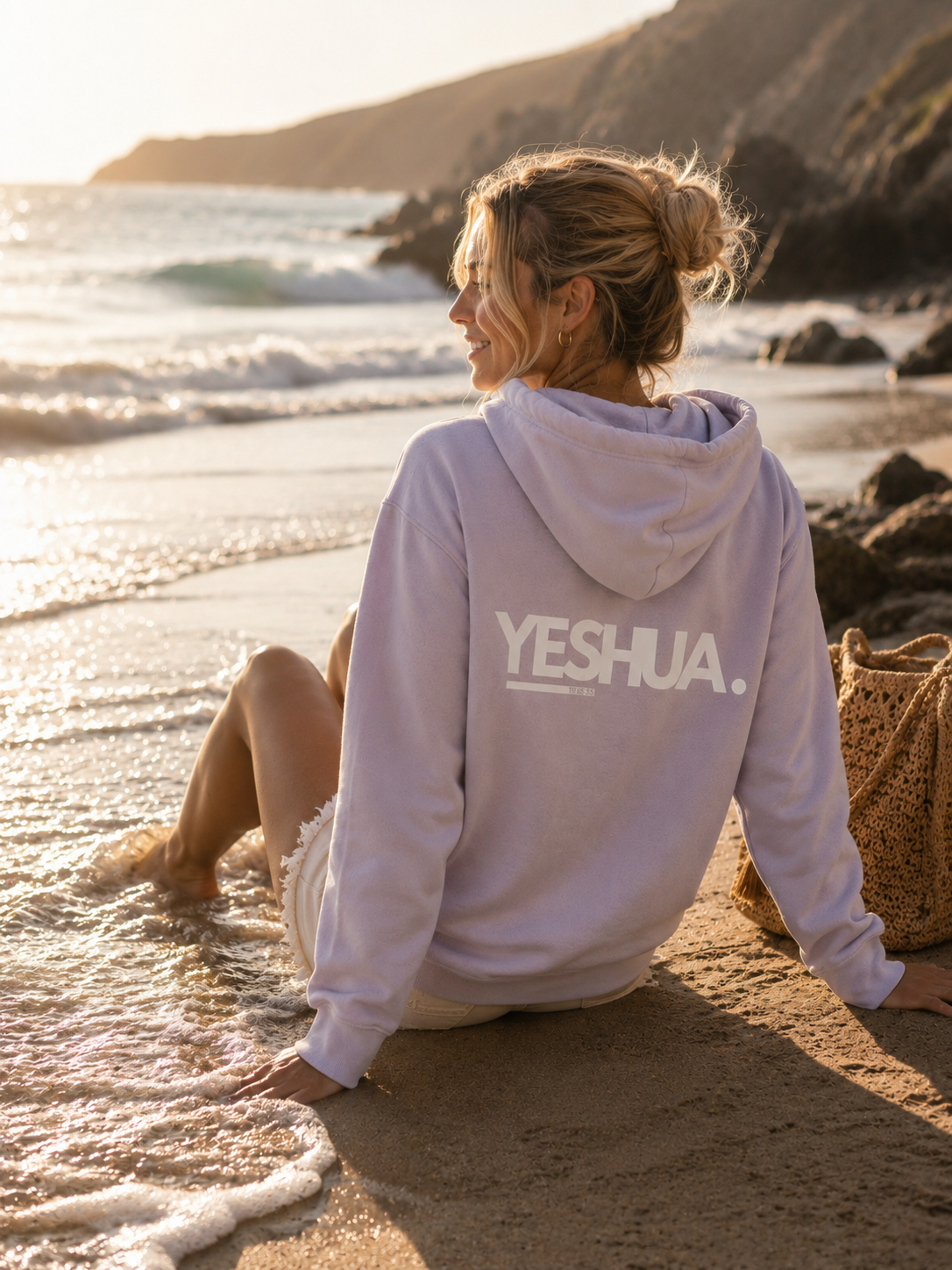 Yeshua Unisex Hoodie Christian hoodie, beach lifestyle shot | Face of Faith faith apparel