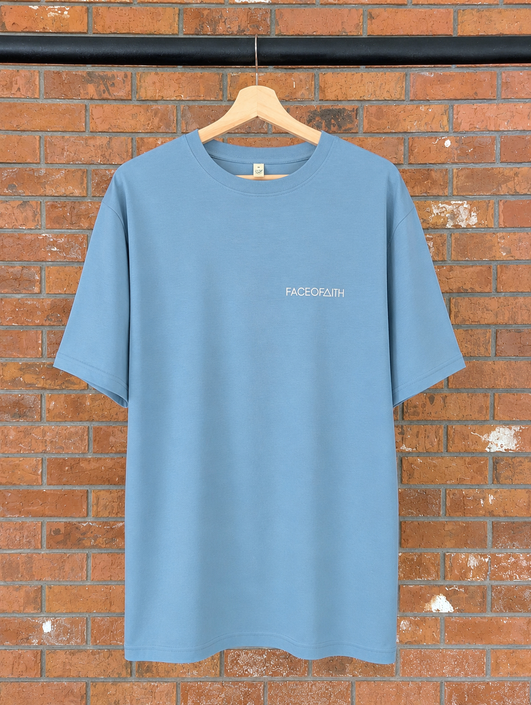 Faceofaith Oversized T-Shirt Christian t-shirt, hanger view | Face of Faith faith apparel
