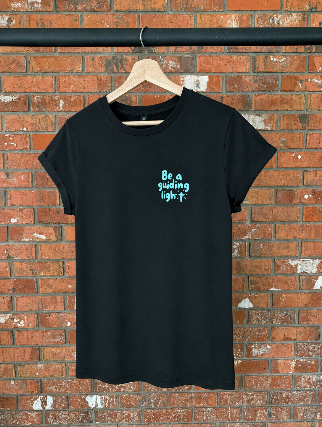 Be A Guiding Light Women's T-Shirt Christian t-shirt, hanger view | Face of Faith faith apparel
