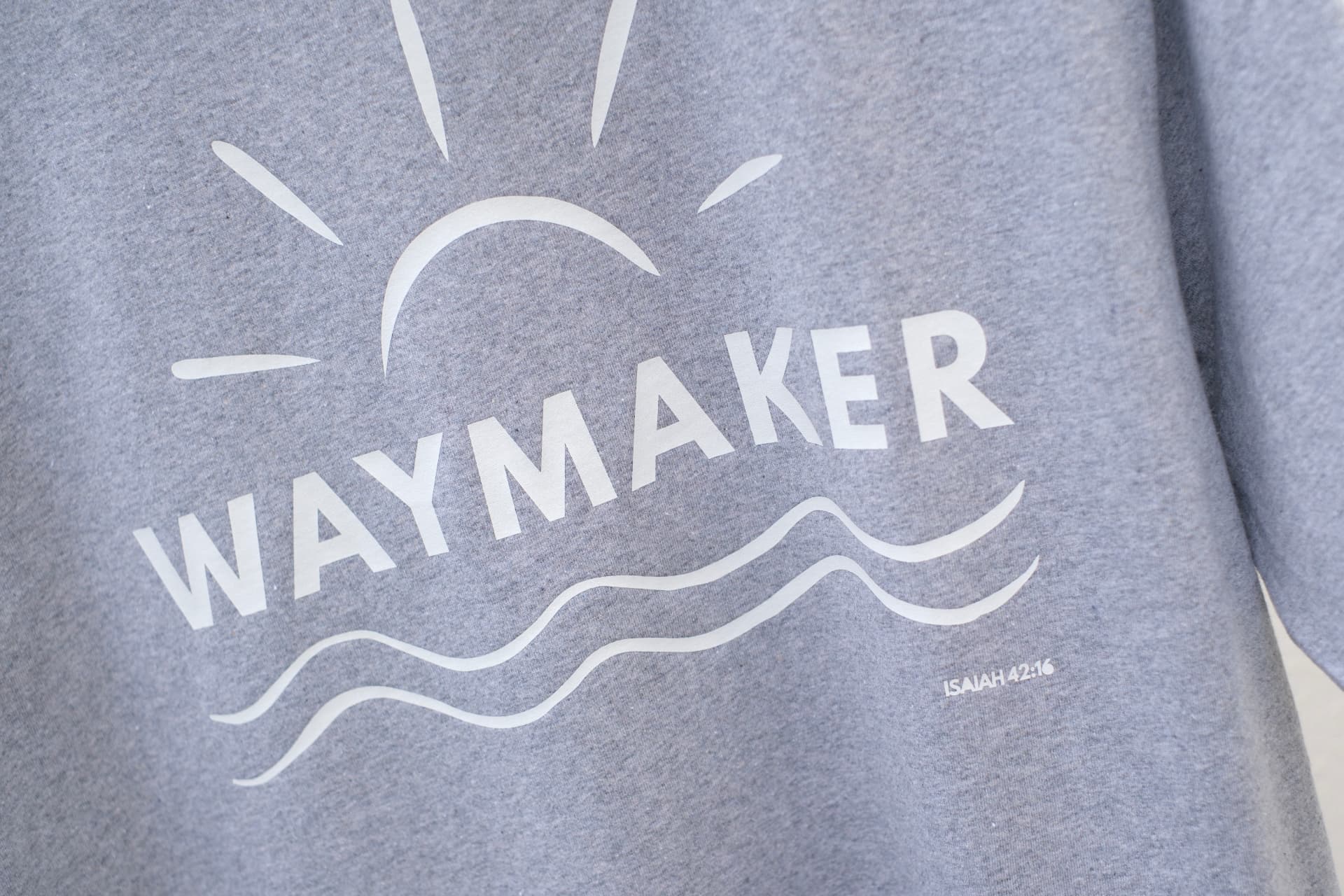 Waymaker Oversized Heavyweight Unisex T-Shirt Christian t-shirt, close-up print detail | Face of Faith faith apparel